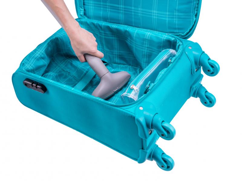 Особенности и преимущества тканевых чемоданов